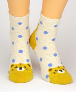 Socken in beige mit Löwen-Motiv und blauen Punkten